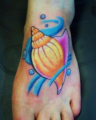 Tatouage coquillage : 35 modèles pour s'inspirer !