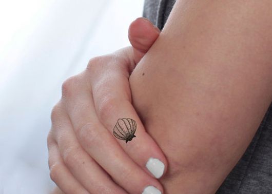 Tatouage coquillage : 35 modèles pour s'inspirer !