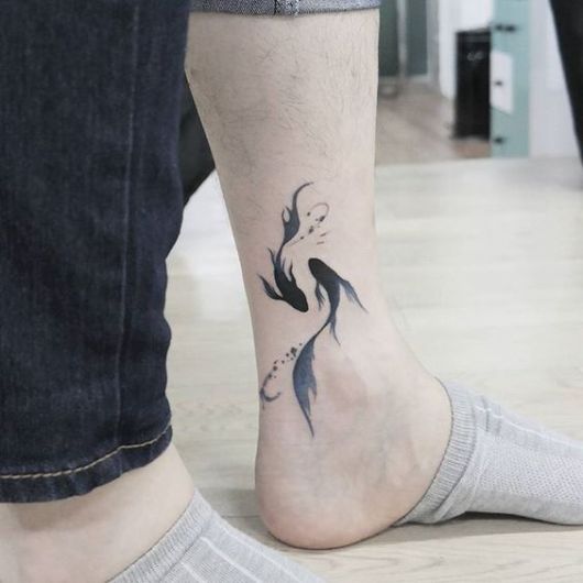 Tatouage de poisson : signification et 30 idées pour s'inspirer