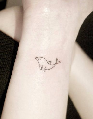 Tatuaggio del delfino: significato e 20 modelli a cui ispirarsi
