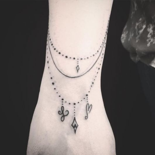 Rosary Tattoo: Meaning, tips and 70 amazing ideas!