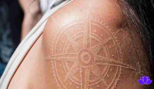 Tatuaggio bianco: cos'è, cura e 25 idee da ispirare